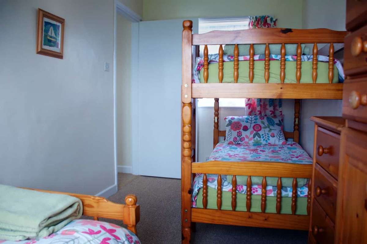 Coshes garden triple bedroom with bunk beds