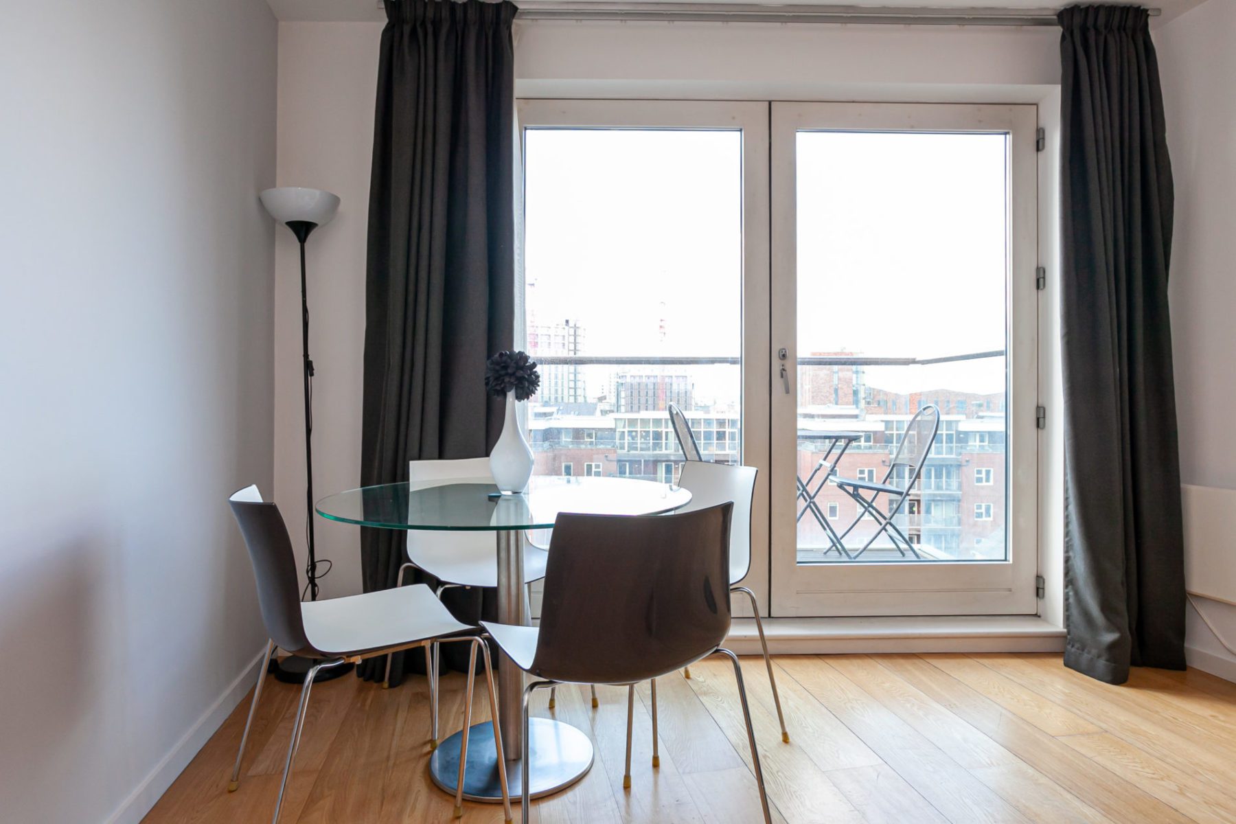 Manchester city centre apartment, dining with balcony